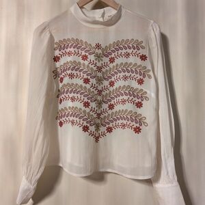 Anthropologie Size 8 embroidered shirt with buttons on back